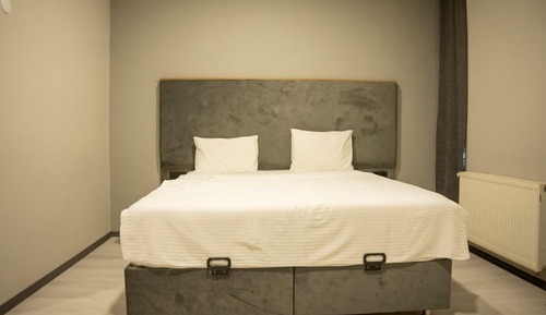 Habitación estándar con 1 cama doble o 2 individuales, vistas a la ciudad