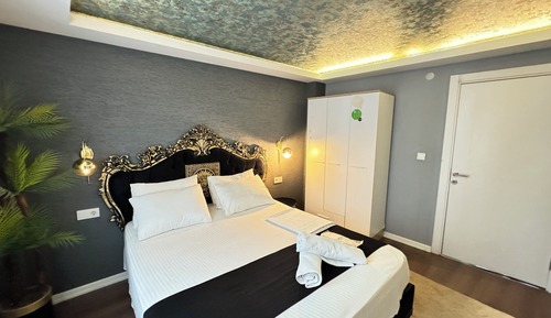 Habitación cuádruple Deluxe, vistas a la ciudad