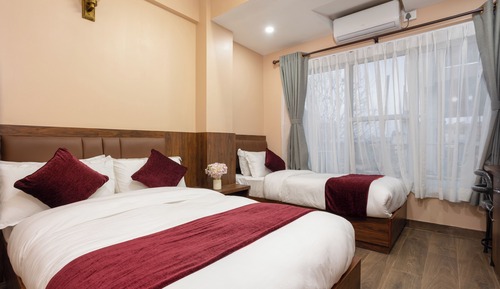Habitación triple Deluxe