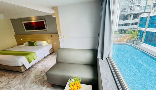 Habitación Deluxe doble, vistas a la piscina