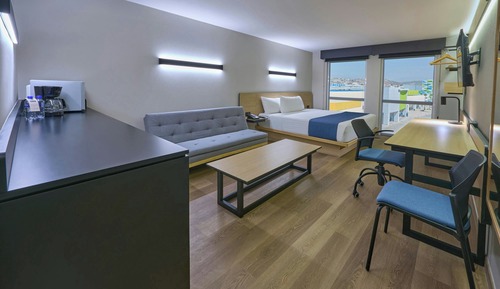 Suite, 1 cama de matrimonio grande, vistas a la ciudad