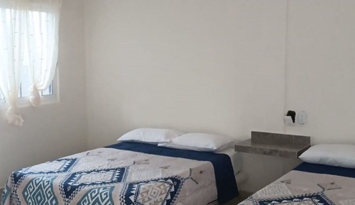 Habitación triple Confort, balcón, vistas al jardín