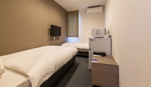 Habitación estándar con 2 camas individuales, no fumadores (check-in is not available after 11PM)