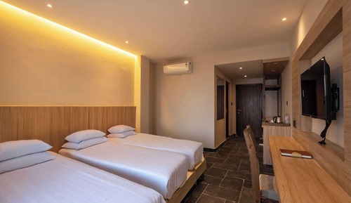 Habitación triple Deluxe
