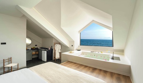 Habitación clásica doble, baño privado, vistas al mar