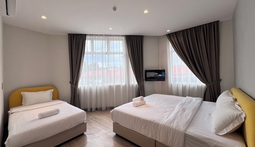 Habitación triple Deluxe