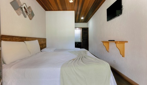 Habitación triple estándar, vistas al jardín