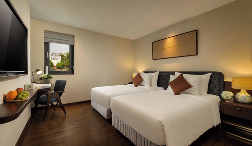 Habitación ejecutiva con 1 cama doble o 2 individuales, vistas a la ciudad