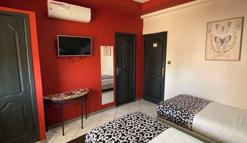 Habitación triple Confort, varias camas