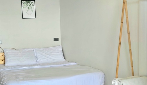 Habitación, vistas parciales al mar