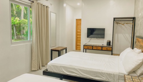 Habitación familiar doble, vistas al jardín