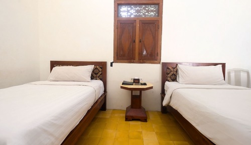 Habitación superior con 2 camas individuales