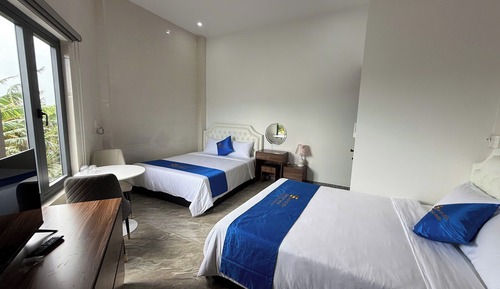 Habitación cuádruple Deluxe