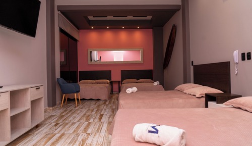 Habitación cuádruple Deluxe