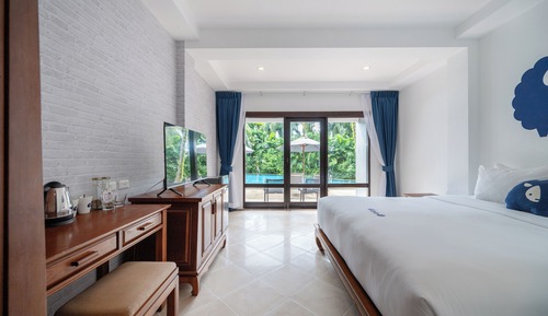 Habitación Deluxe doble, acceso a la piscina