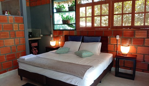 Habitación triple Deluxe, balcón, vistas al jardín