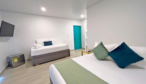 Habitación cuádruple Deluxe