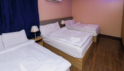 Habitación triple Deluxe