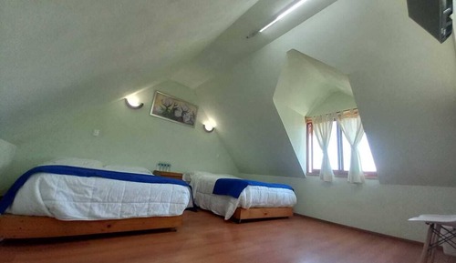 Habitación familiar, vistas al jardín