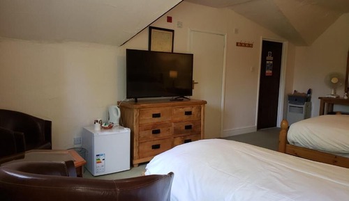Habitación triple Deluxe