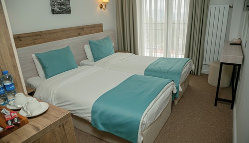 Habitación Deluxe con 1 cama doble o 2 individuales, balcón