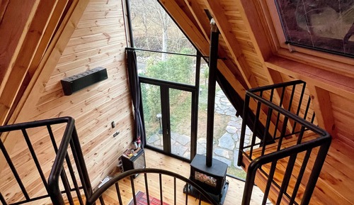 Casa Conforten un árbol