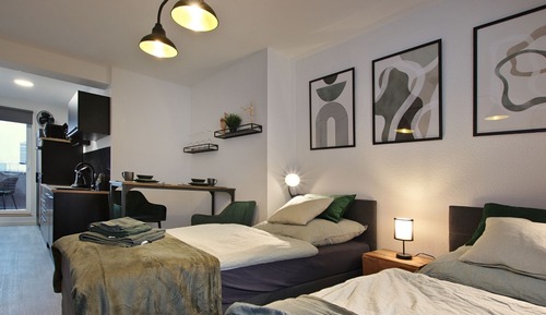 Apartamento Business, varias camas, balcón, vistas a la ciudad
