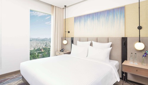 Suite junior, 1 cama de matrimonio grande, vistas a la ciudad
