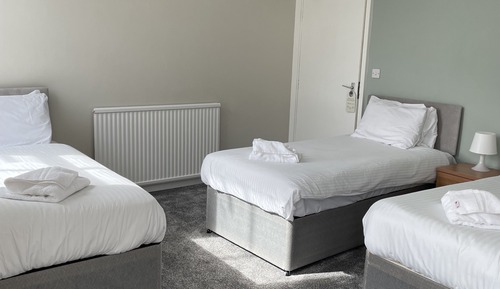 Habitación cuádruple estándar, varias camas