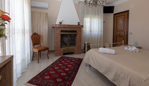 Habitación triple, vistas al parque