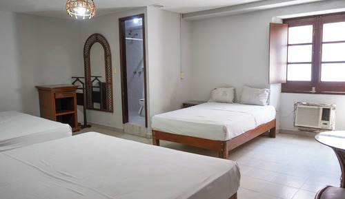 Habitación triple estándar, varias camas