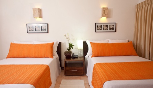 Habitación doble, 2 camas de matrimonio, vistas al jardín