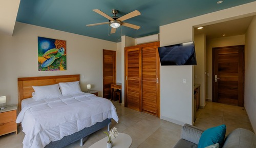 Apartamento Deluxe, 1 cama de matrimonio con sofá cama, vistas parciales al mar