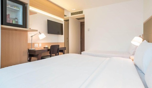 Habitación triple ejecutiva, varias camas