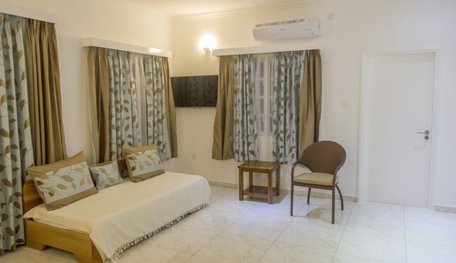 Habitación triple familiar, varias camas