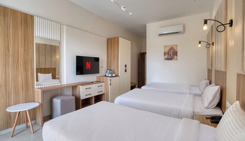 Habitación triple Deluxe, balcón, vistas a la montaña