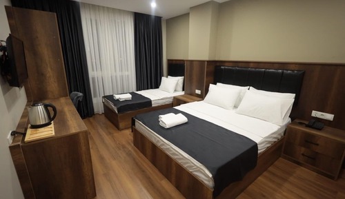 Habitación triple Deluxe, vistas a la ciudad