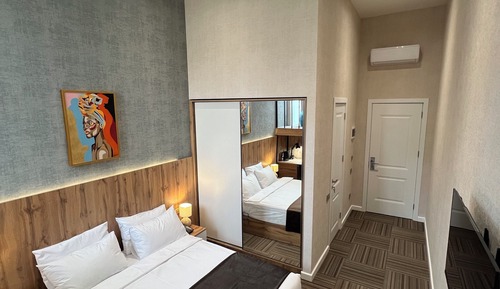 Habitación con 1 cama doble o 2 individuales, vistas a la ciudad