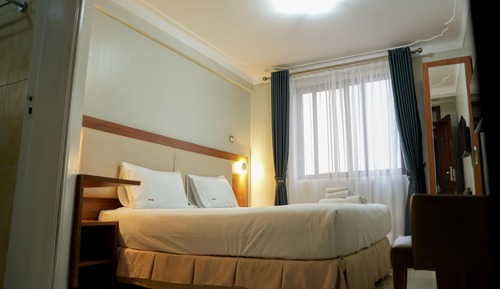 Habitación Deluxe con 1 cama doble o 2 individuales, balcón, vistas a la ciudad