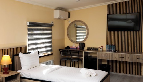 Habitación triple Confort, vistas a la ciudad