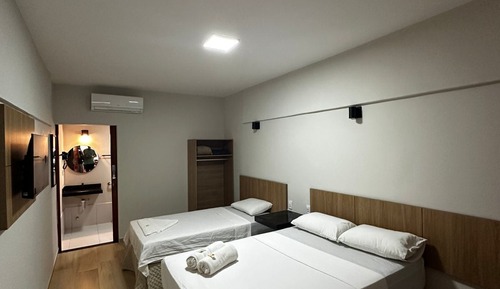 Habitación triple exclusiva, vistas al patio