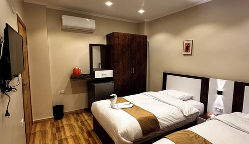 Habitación superior con 1 cama doble o 2 individuales