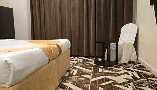Habitación básica con 2 camas individuales