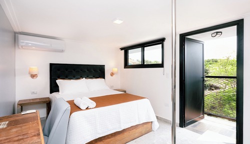 Habitación Elite, bañera, vistas parciales al mar