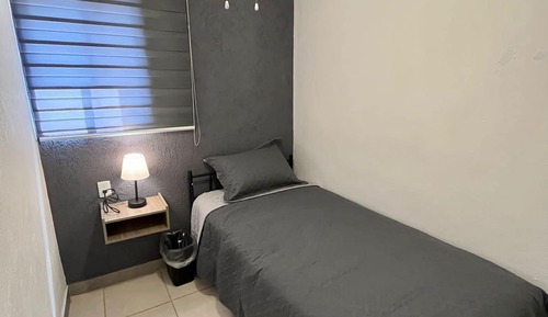 Habitación económica, 1 cama individual, baño compartido
