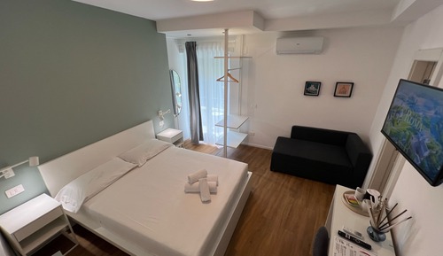 Habitación triple superior, balcón
