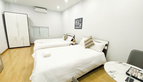 Habitación familiar con 2 camas individuales