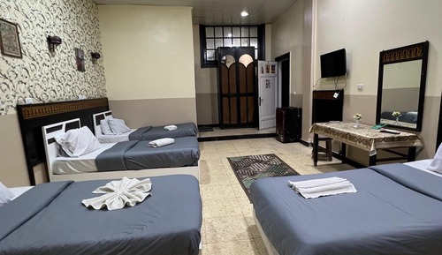 Habitación cuádruple Deluxe, vistas a la ciudad