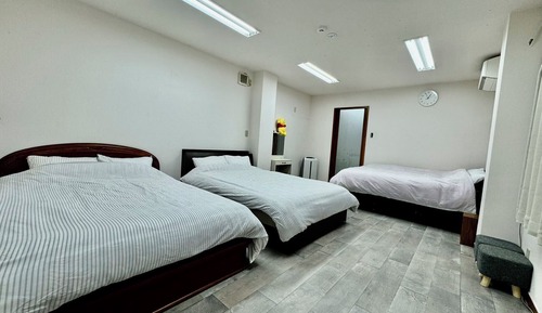 Habitación Business triple, vistas a la ciudad