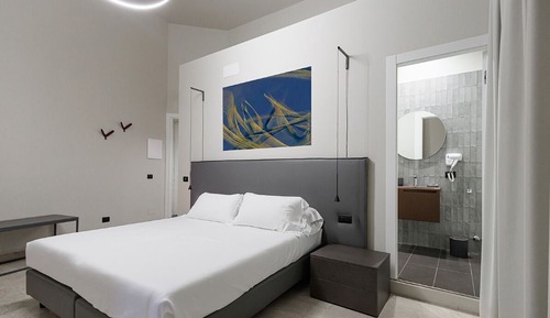 Habitación Deluxe con 1 cama doble o 2 individuales, balcón, vistas a la ciudad